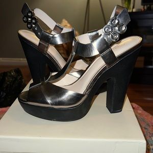 Authentic Coach pewter platform heeled sandal.